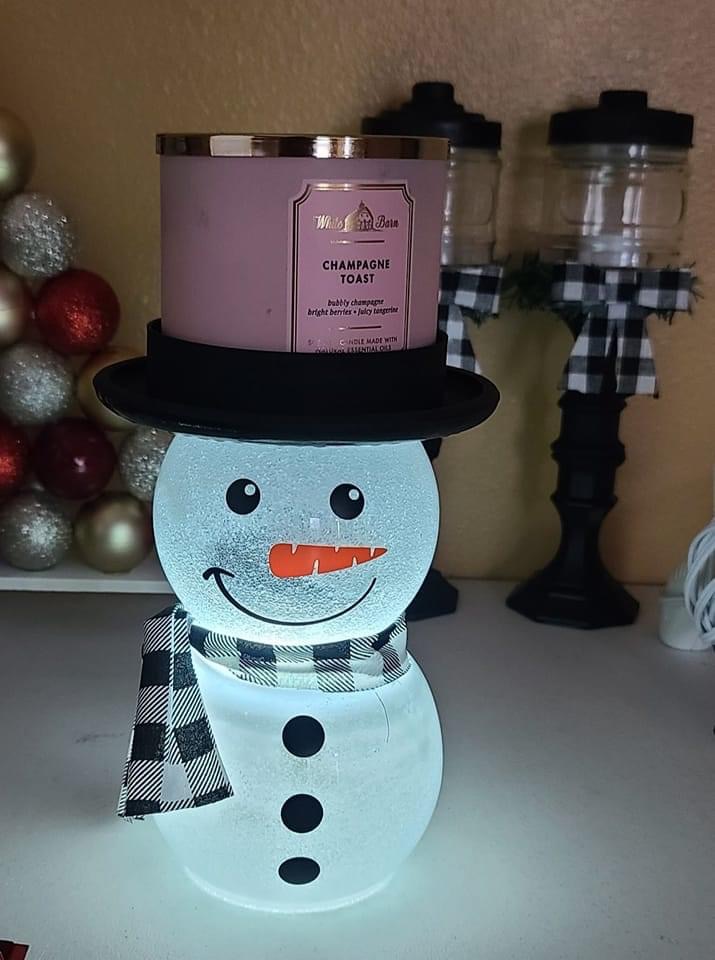 Handmade snowman candle holder example